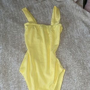 Yellow bodysuit
